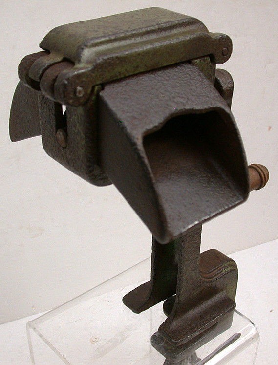 Early Cast Bean Sheller with Deco Pattern and Wooden Handle