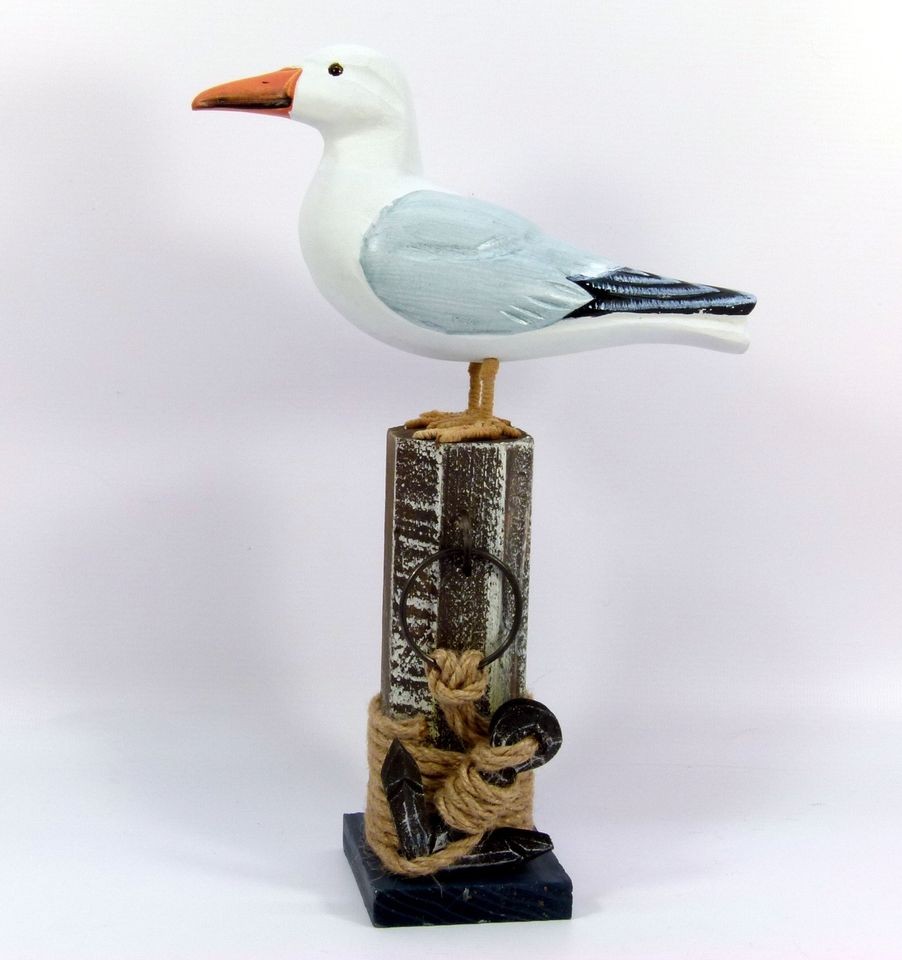 Model Seagull perched on mooring post with anchor, nautical, seaside 