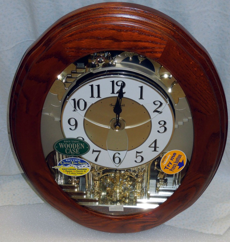 RHYTHM MUSICAL WALL CLOCK  THE JOYFUL NOSTALGIA IN OAK WITH 18 