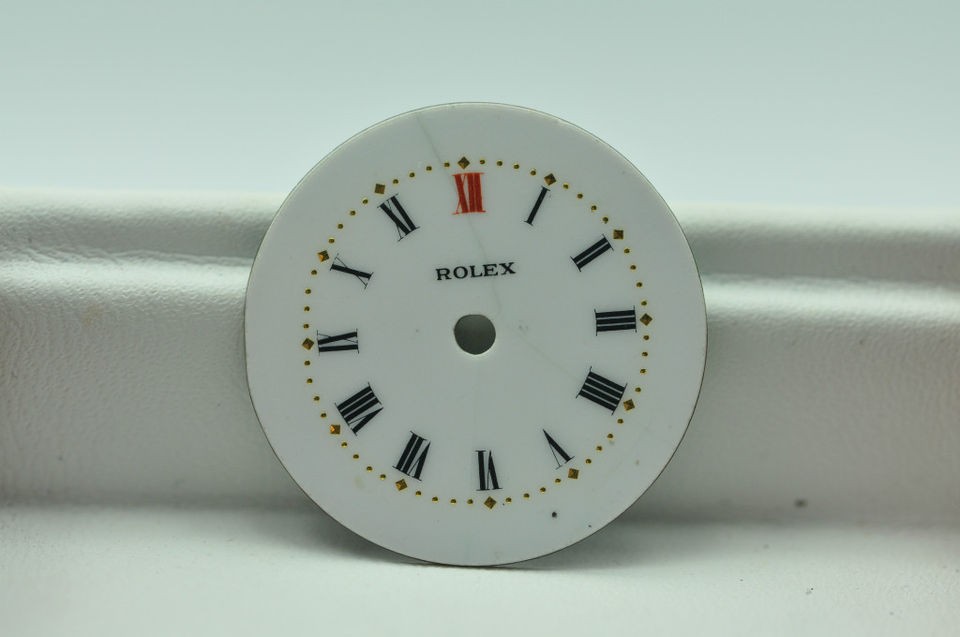 ROLEX ROUND WHITE DIAL RED 12 OCLOCK MARKER