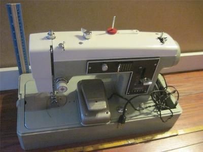 Sewing machine Model 15812332  Singer Kenmore Button Magic thread 