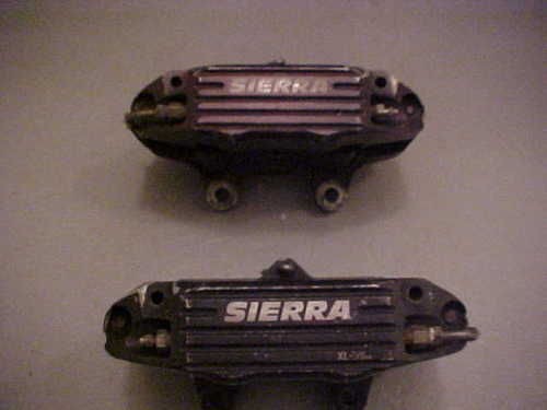 SIERRA 4 PISTON CALIPERS LOT(2) REAR PISTONS.810 ROTORS WILWOOD AP 