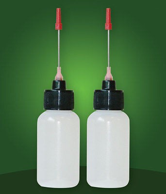 Two 1 OZ bottles with needle tip dispenser, pharmaceutical grade
