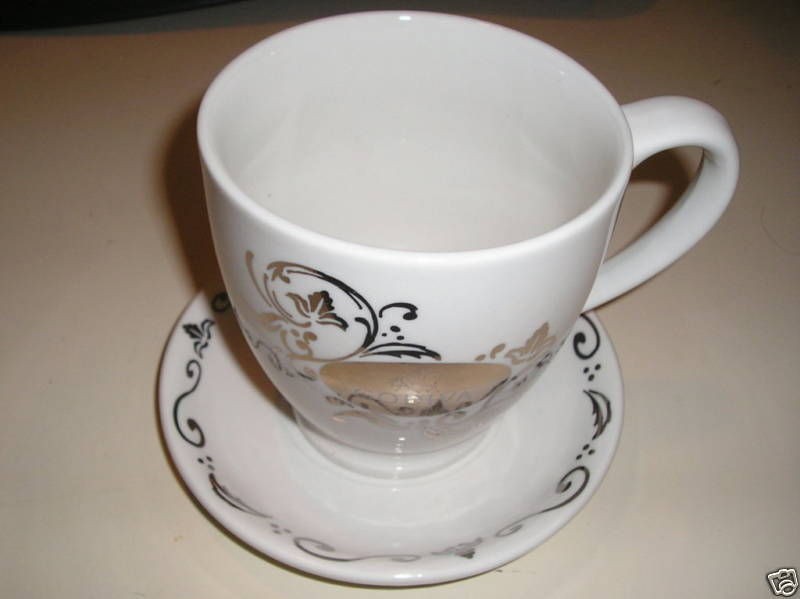 large godiva cup and saucer produced for designpac inc time