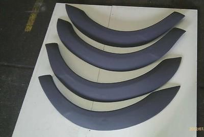 MERCEDES ML W163 EXTENDED WHEEL ARCH SETX4 made of grp PRIMED