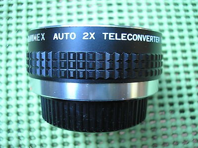 HANIMEX, JAPAN, AUTO 2X TELECONVERTOR, FOR OLYMPUS OM 35mm SYSTEM.