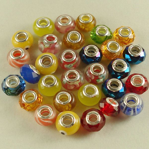 These beads are designed to fit any popular charm bracelet .