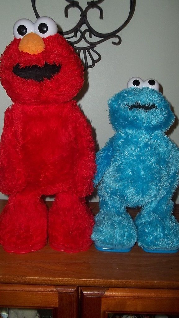 TMX 2005 Tickle Me Elmo TMX 2006 Tickle Me Cookie Monster