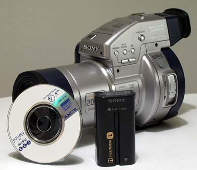 camera shown with 3 cd r and np f550 battery