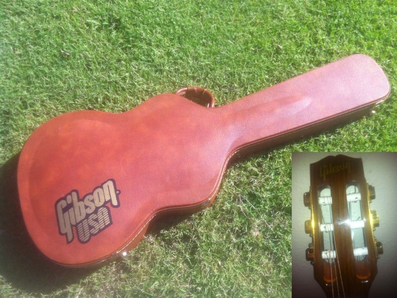 this is an electric nylon string guitar with controls for