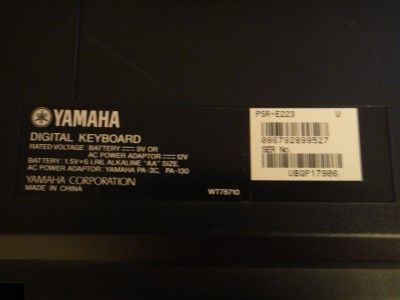 Yamaha PSR E223 Keyboard with AC adapter, music sheet holder and