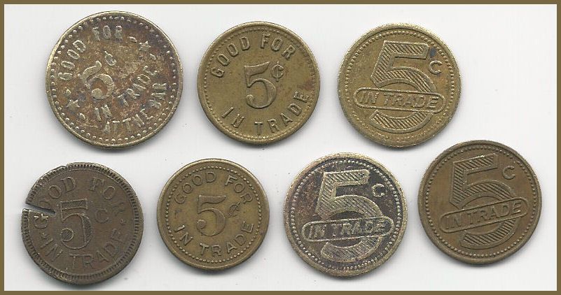 19. LOT OF 7 WISCONSIN US TRADE TOKENS BRASS BARABOO DEANSVILE