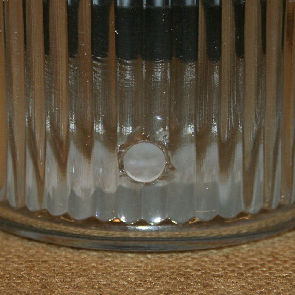 This is a tea light candle tart warmer in a Hoosier Tea jar.