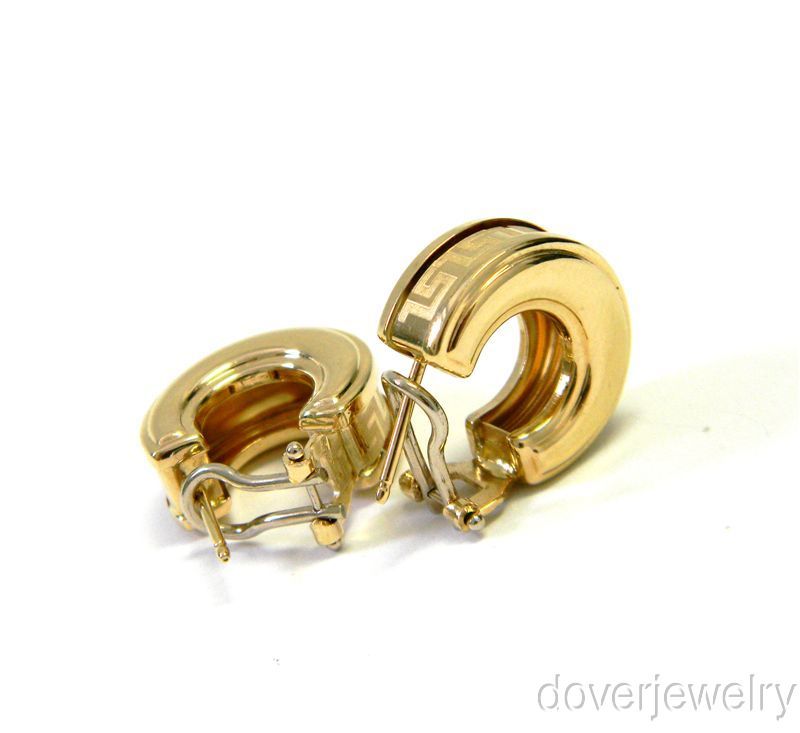  Italian estate huggie earrings are crafted in solid 14K yellow gold