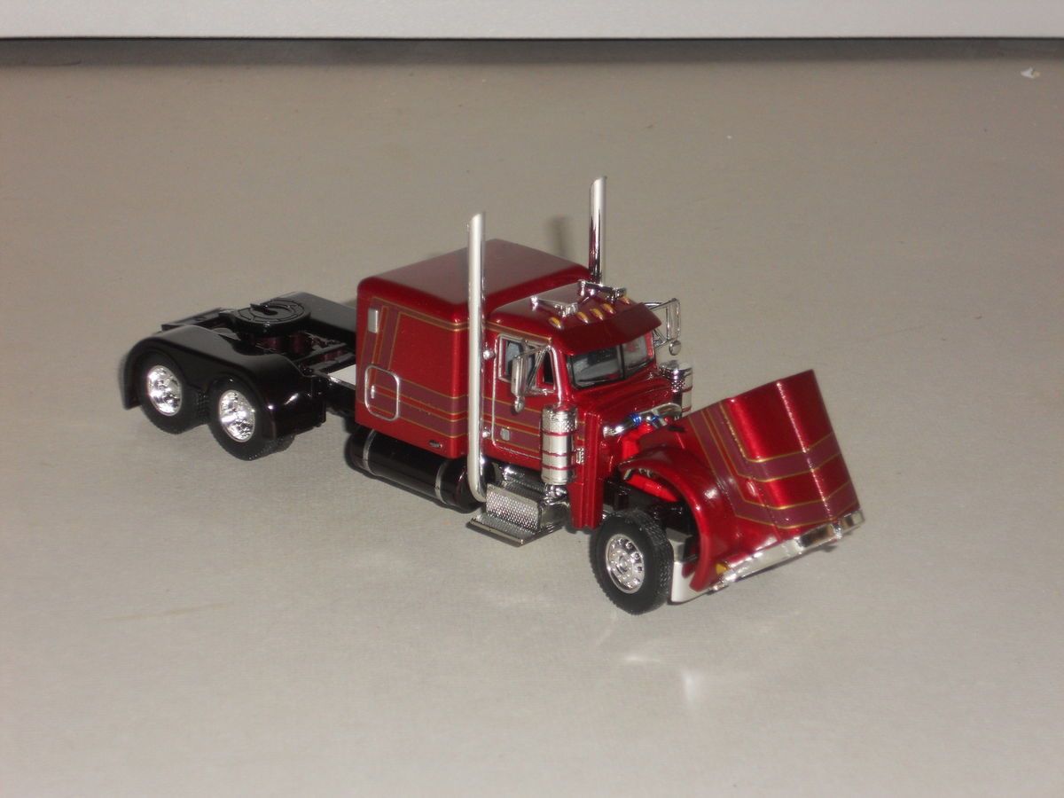 64th DCP Maroon & black 379 Peterbilt w/ 60 sleeper. Has straight