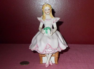 MILANO EDA MANN GIRL holding GIFT FIGURINE Vintage Porcelain Sculpture