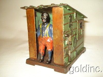 Nice 19th C.J&E Stevens Co. Cast Iron Mechanical Cabin Bank 