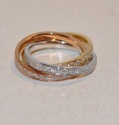 07CT PAVE DIAMOND ROLLING RING 18KT TRI COLOR GOLD