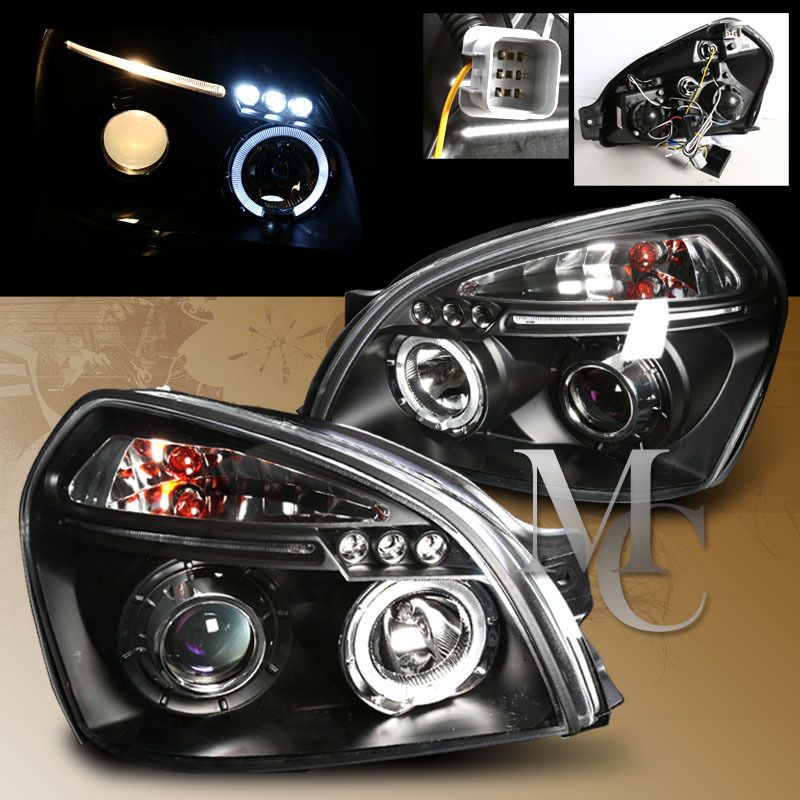 2005 2009 HYUNDAI TUCSON DUAL HALO RIM LED PROJECTOR BLACK HEADLIGHTS